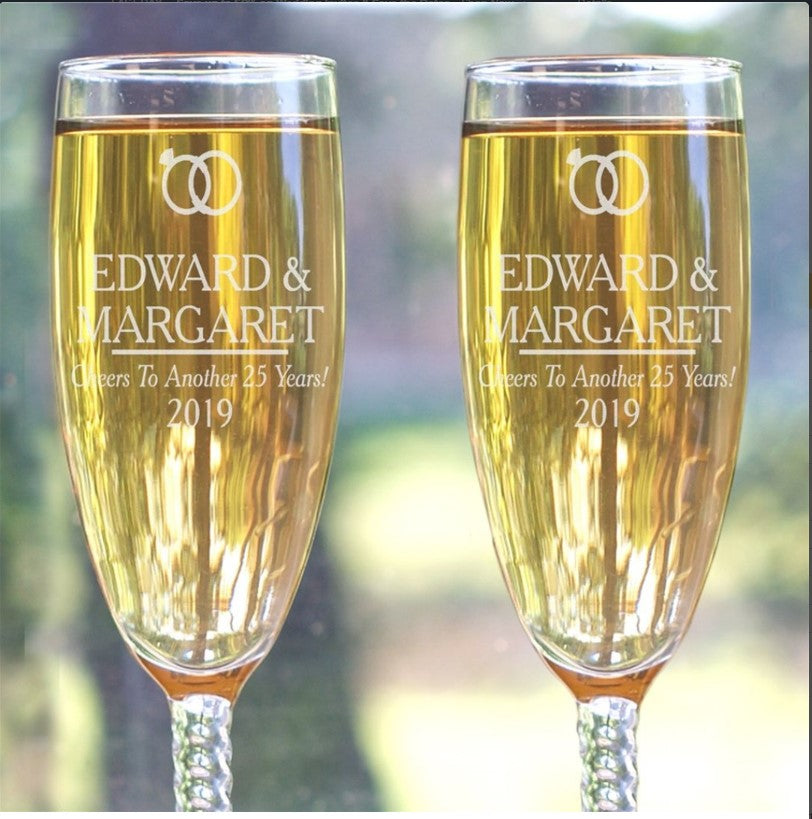 Set of 2 Engraved Champagne Glasses.
